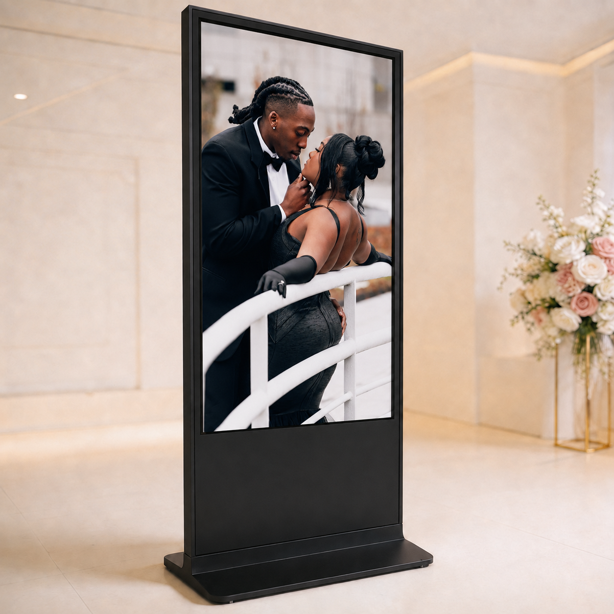 A 65 inch digital displays wedding reception setup
